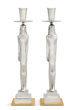 A pair of Edvin Öhrström 'Egyptian' pewter candlesticks, Svenskt Tenn, Stockholm 2001.