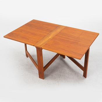 A teak gateleg table second part of the 20th Century.
