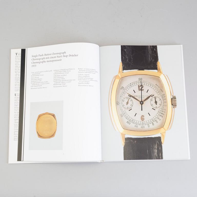 A set of 2 books about PATEK PHILIPPE watches.