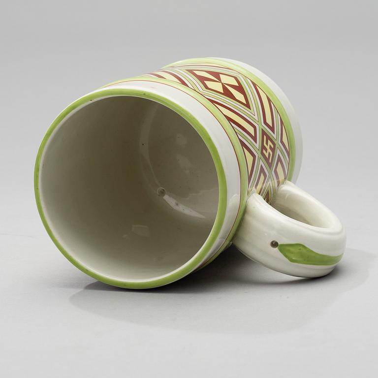 A MUG. Fennia series. The designers Jac. Ahrenberg och Thure Öberg.