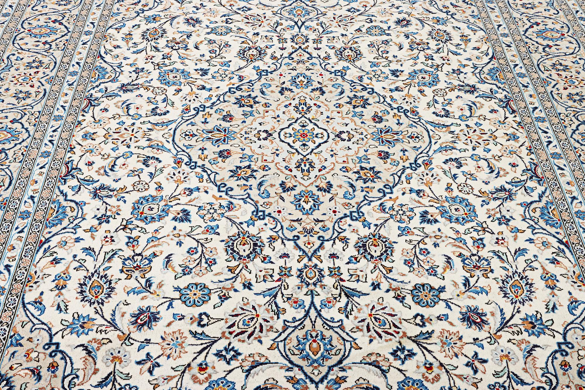 A Kashan carpet, c. 355 x 238 cm.