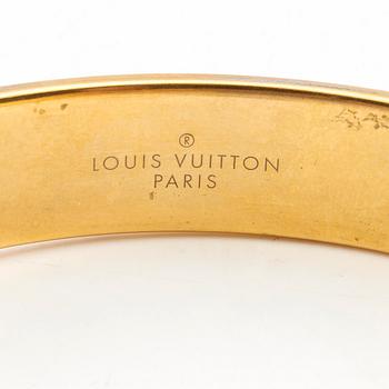 Louis Vuitton, Plånbok "Zoe" samt armband.