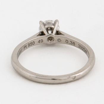 A brilliant cut diamond ring by Cartier.