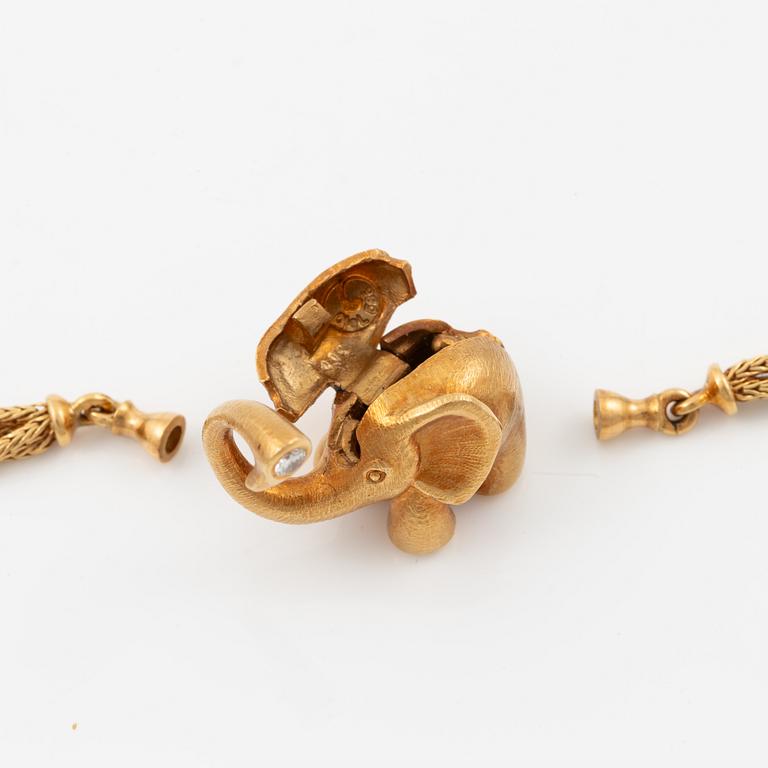 Ole Lynggaard lock 14K gold with a round brilliant-cut diamond.