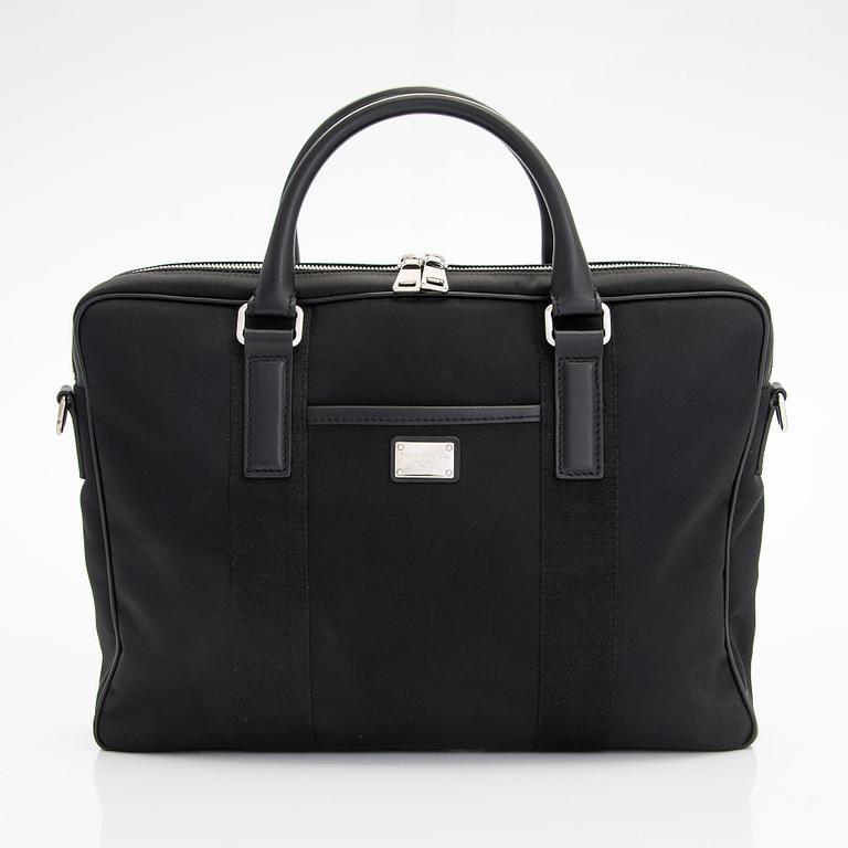 Dolce & Gabbana, A canvas briefcase and a leather pouch/clutch.