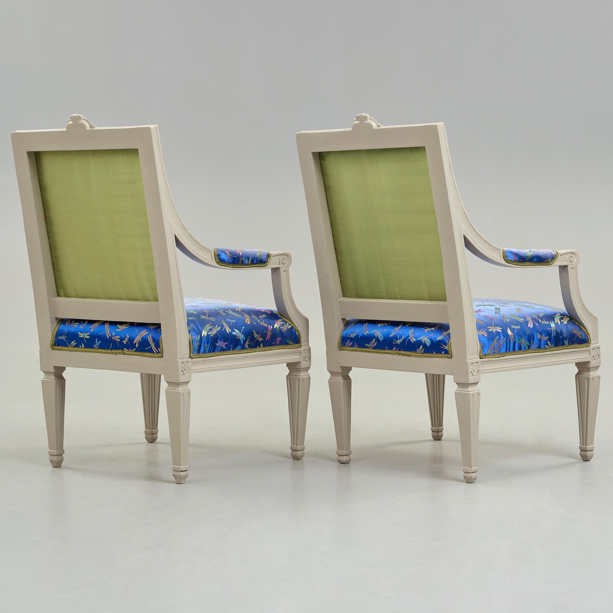 A pair of large Gustavian late 18th century armchairs.