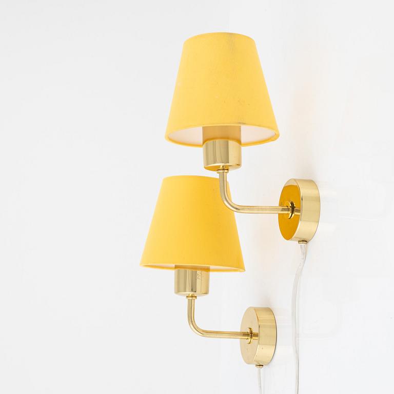 Josef Frank, a pair of model 2143 brass wall lights, Firma Svenskt Tenn, Sweden.