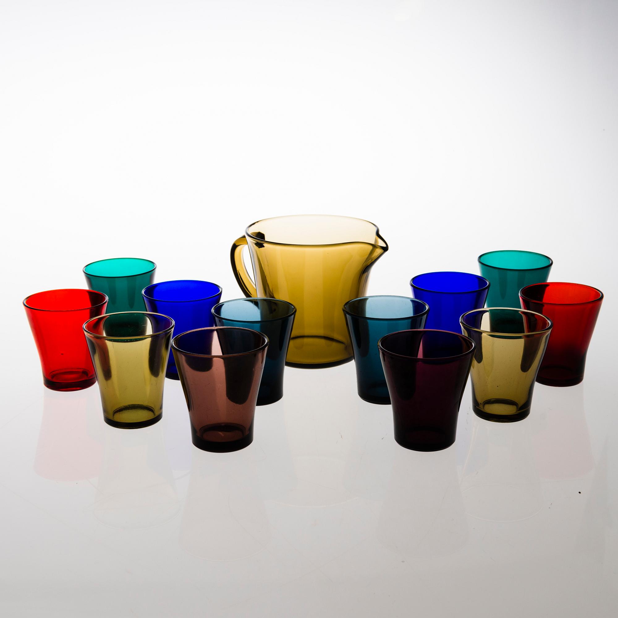 A set of 1950's twelve drinking glasses and one pitcher for Riihimäki Lasi.