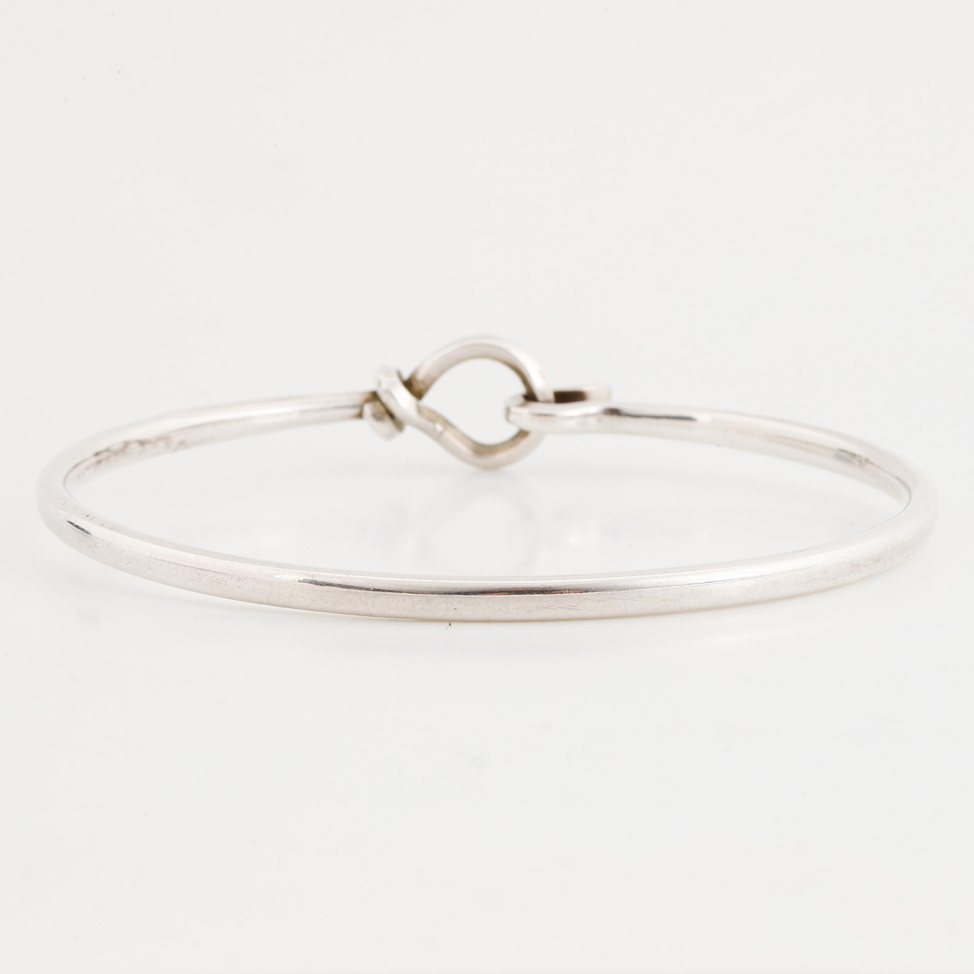 Vivianna Torun Bülow-Hübe, a sterling silver 212 bangle, Georg Jensen, Denmark.