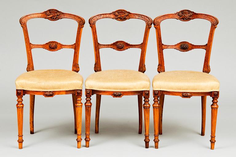 A SET OF THREE CHAIRS.