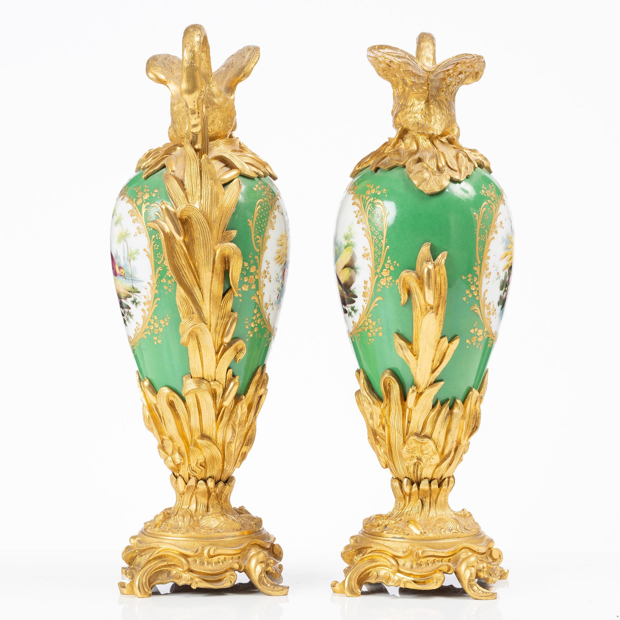 A pair of Louis XV-style gilt bronze and porcelain decorative ewers, France, later part 19th century.