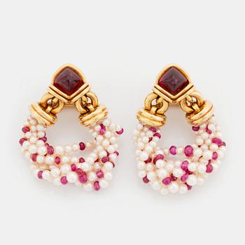 407. A pair of Bulgari 18K gold earrings with sugarloaf-cut rubelites and cultured pearls and ruby beads.