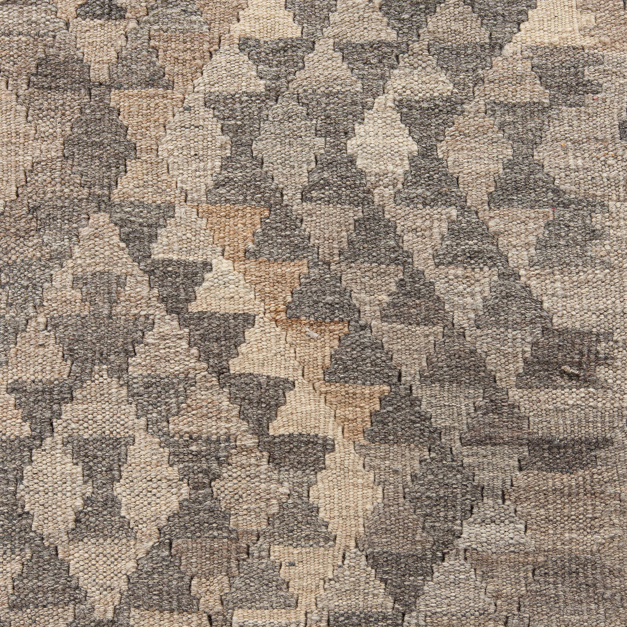 A Kilim carpet, ca. 262 x 176 cm.