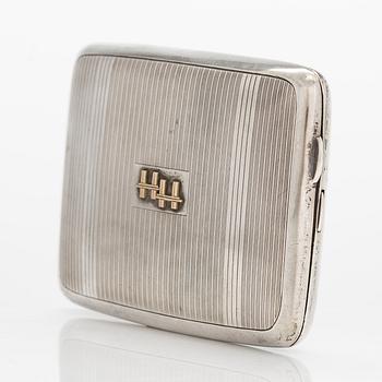 An Art deco sterling silver cigarette case, Sheffield 1929.