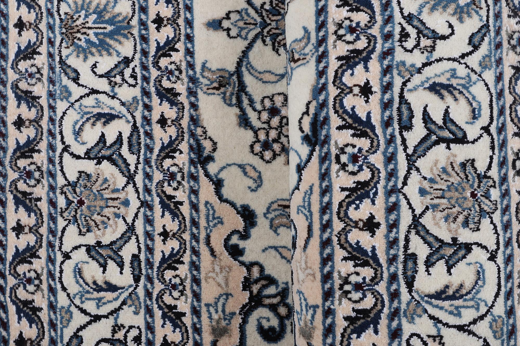 Rug, Nain, part silk, ca. 200 x 154 cm.
