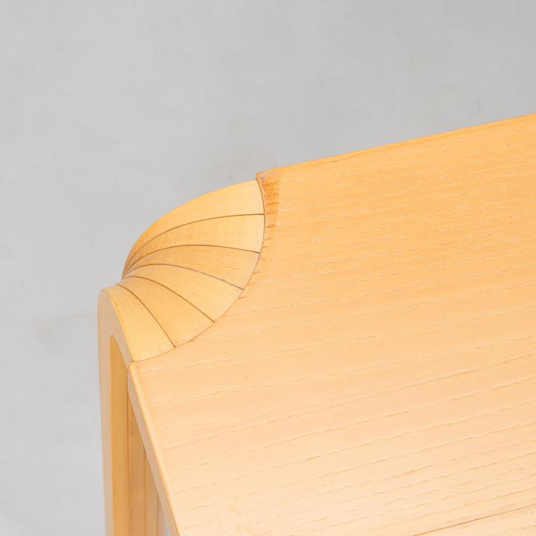 Alvar Aalto, a 1960s coffee table model MX800B, altered, for Artek.