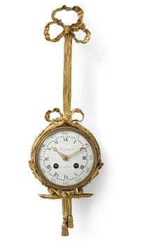 143. A French Louis XVI-style gilt-bronze cartel clock, 19th century.