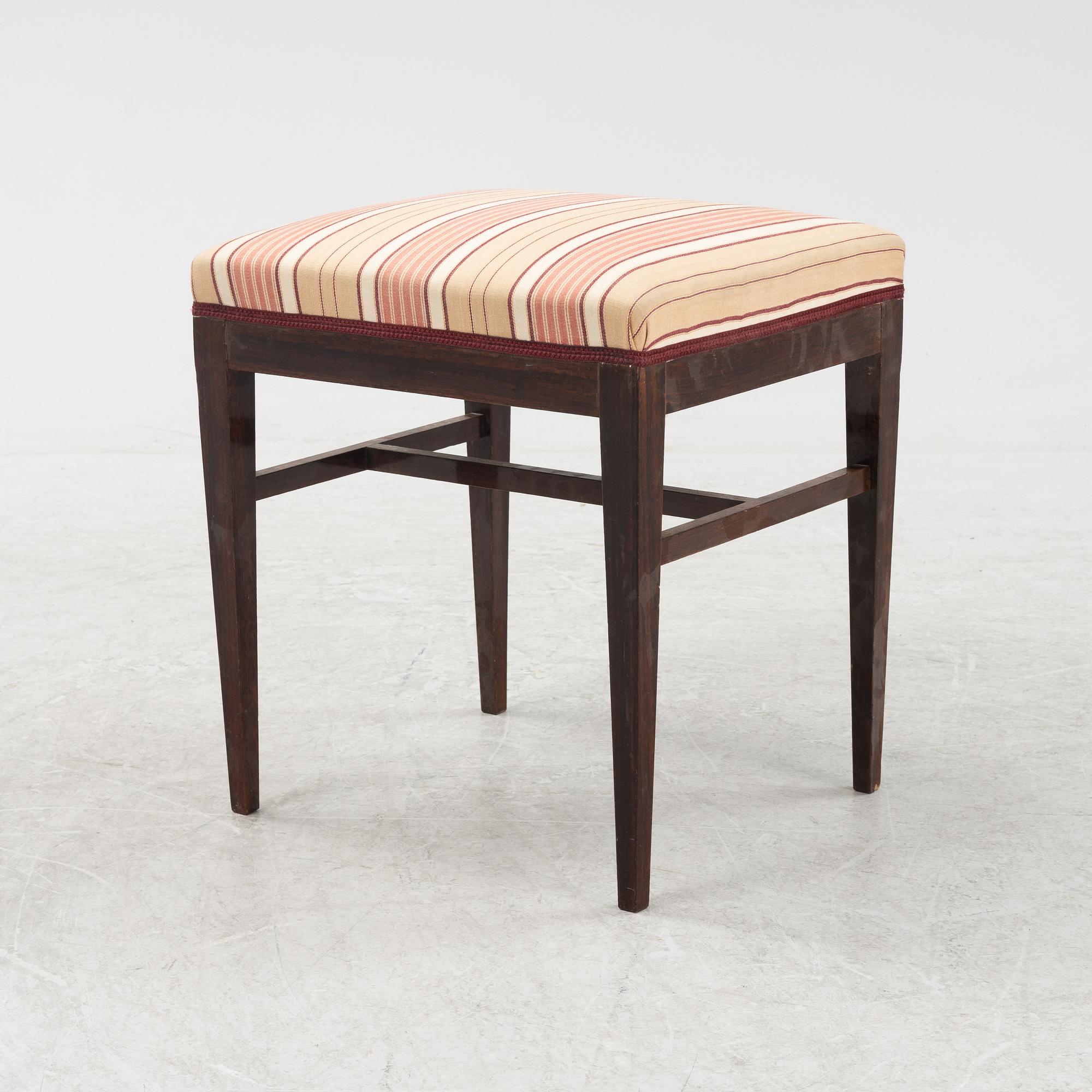 A group of five rosewood veneered chairs and a stool, mid 20th Century.