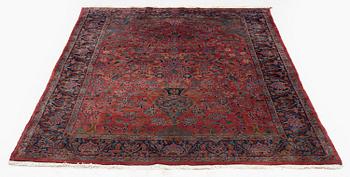 An antique Manchester Kashan rug, c. 197 x 126 cm.