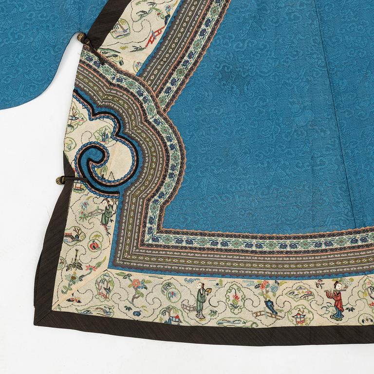 A Han Chinese woman's heather blue informal three quater length coat, 'Ao', Qing dynasty, 19th century.
