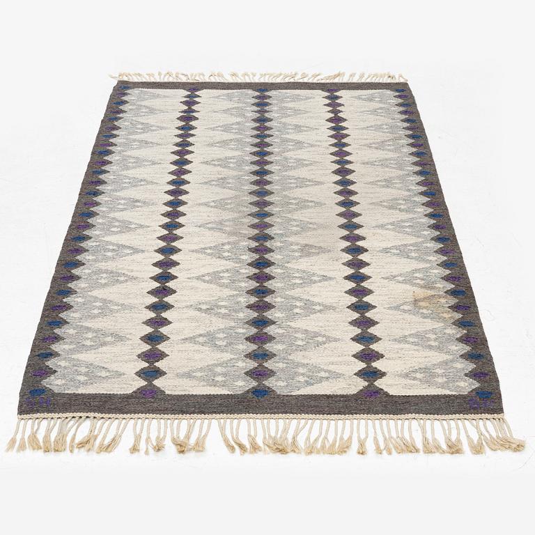 Berit Koenig,a flat weave rug, signed SH BK, c. 208 x 132 cm.
