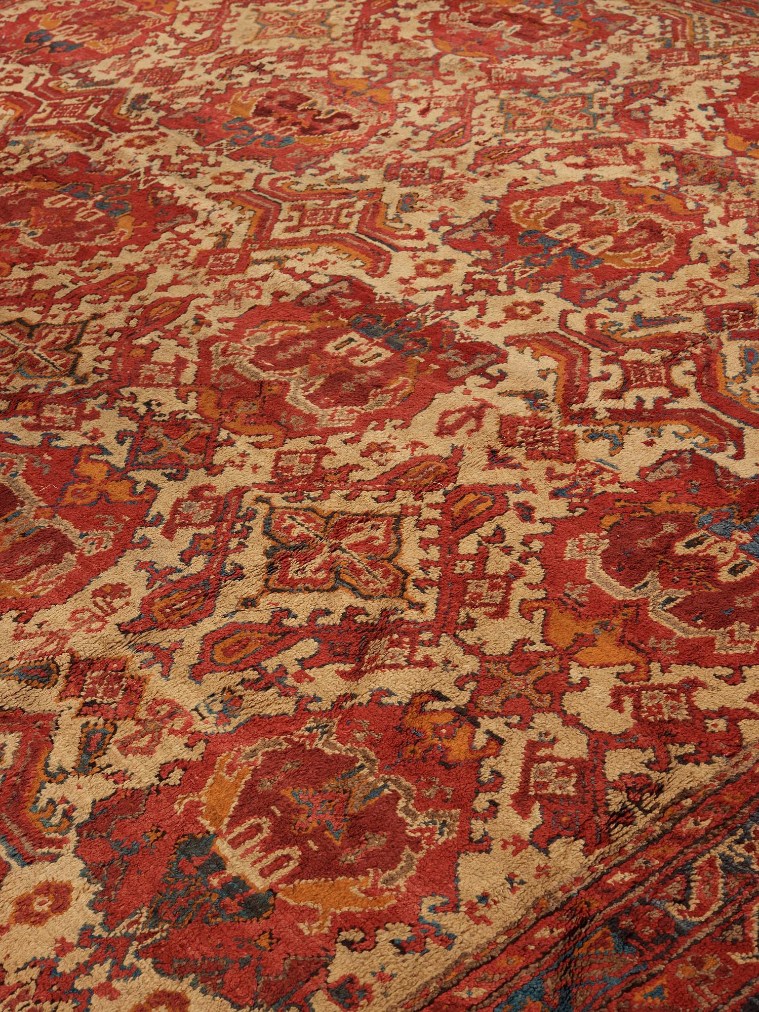 A CARPET. An antique Ushak. 554,5 x 480 cm.