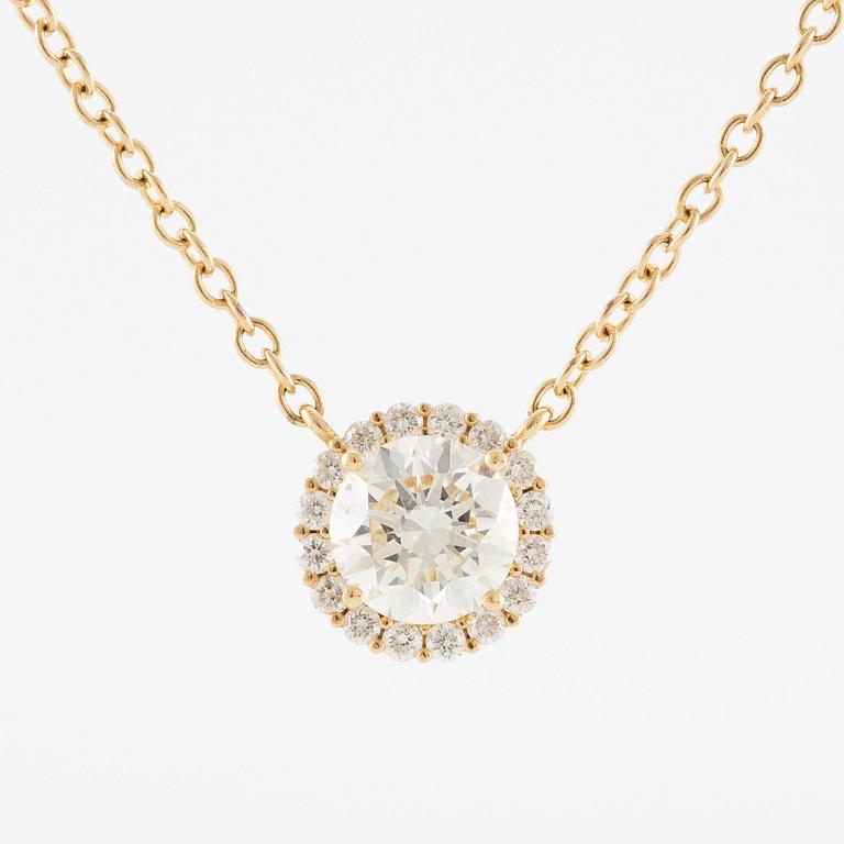 Collier 18K guld med briljantslipade diamanter.
