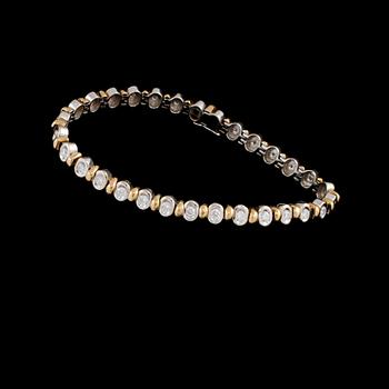ARMLÄNK, 18k guld och vitguld med 30 briljantslipade diamanter, ca 1.20 ct, Italien, 1900-talets slut.  Vikt 19 g.