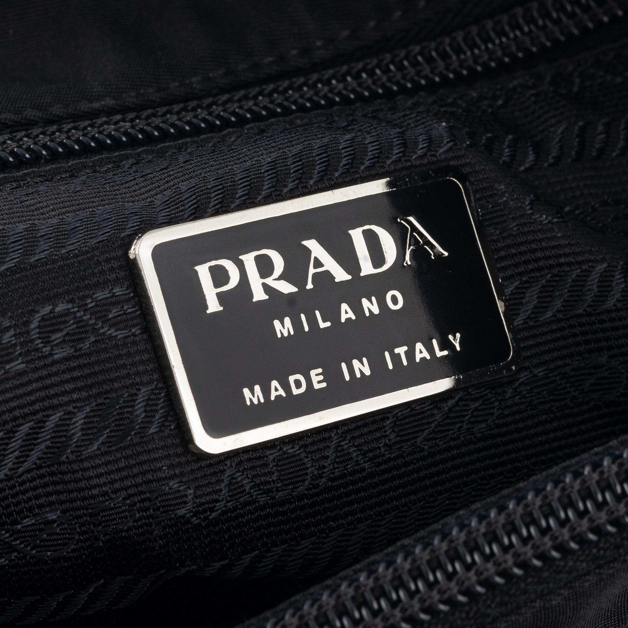 Prada, a black nylon handbag.