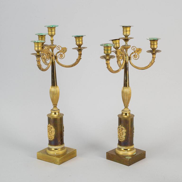 A pair of empire style candelabra, first half of the 20th century.