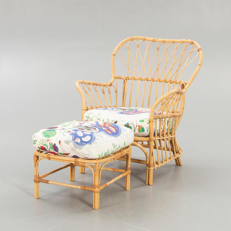 Josef Frank, Armchair with footstool, Firma Svenskt Tenn, model 311.