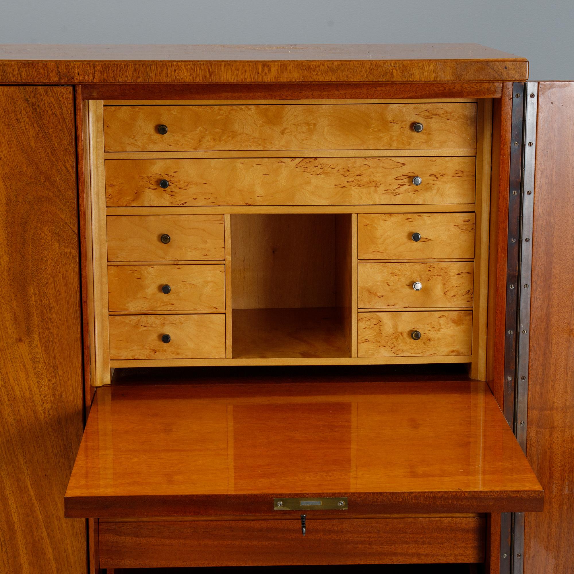 A 1940's Swedish Modern mahogany veneered cabinet.