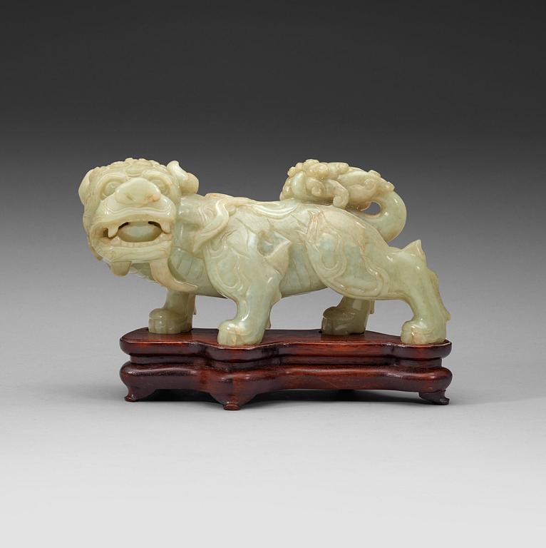 A green nephrite mytological lion, 20th century.