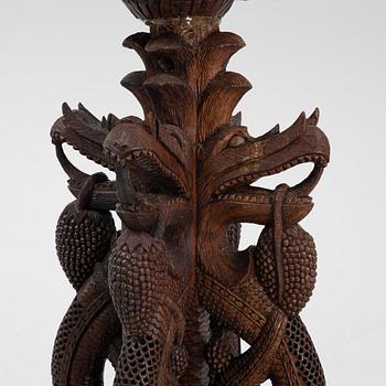 A South East Asian carved wooden piedestal,  20th Century.