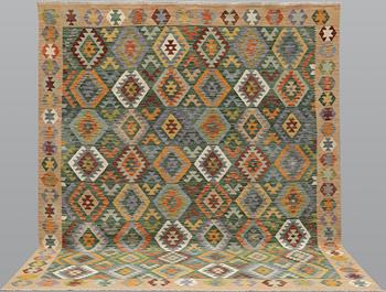 A Kilim carpet, approx. 290 x 250 cm.