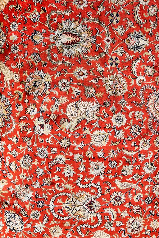 A pictoral orientalisk silk carpet, ca 284 x 180 cm.