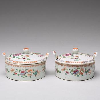 A pair of famille rose 'double peacock' condiment dishes, Qing dynasty, Qianlong (1736-95).