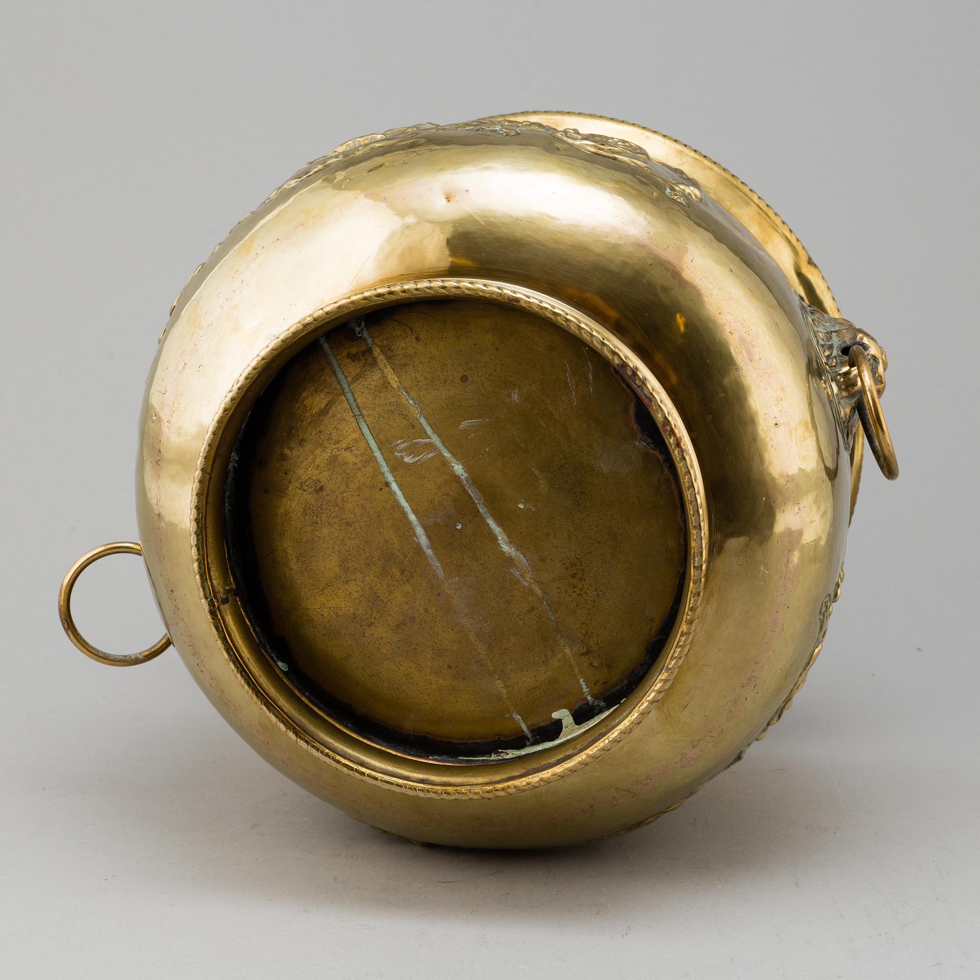 An 18th/19th century brass flower pot.