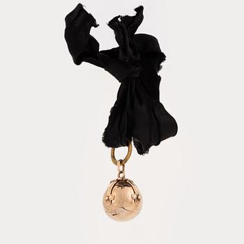 A round freemason pendant.