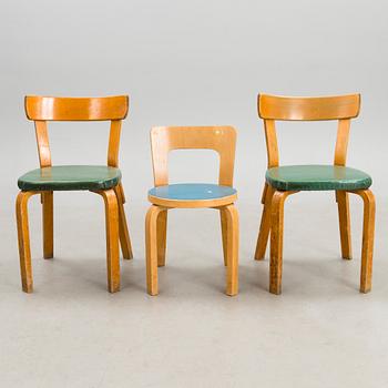 A pair of mid-20th Century chairs and a children's chair from the 1970s, for Artek.