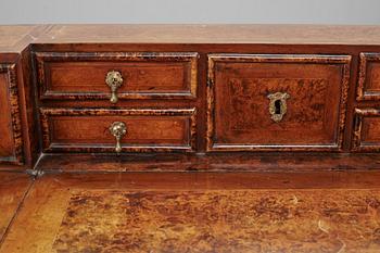 A Swedish late Baroque alder-veneered 'knee-hole' writing desk, first part of the 18th century.