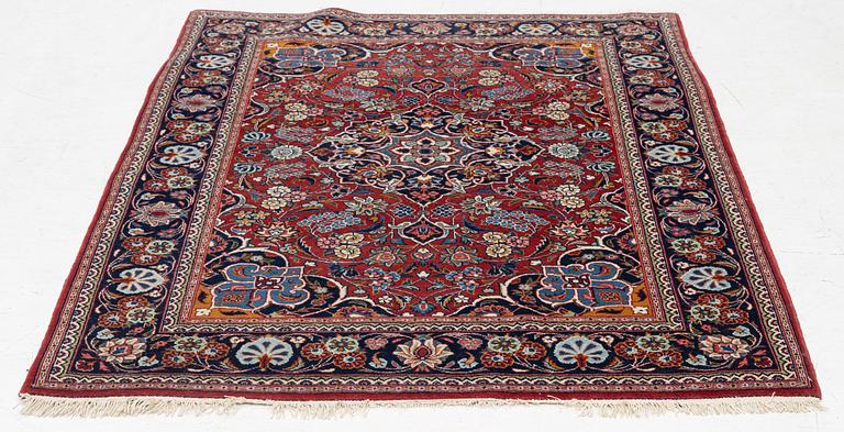 An oriental carpet, approx. 170 x 100 cm.