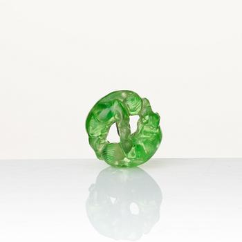 A green sculptured bead, Qing dynasty.