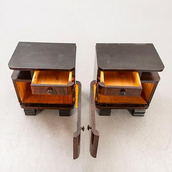 A pair of Art Deco 1940s walnut bedside talbes.