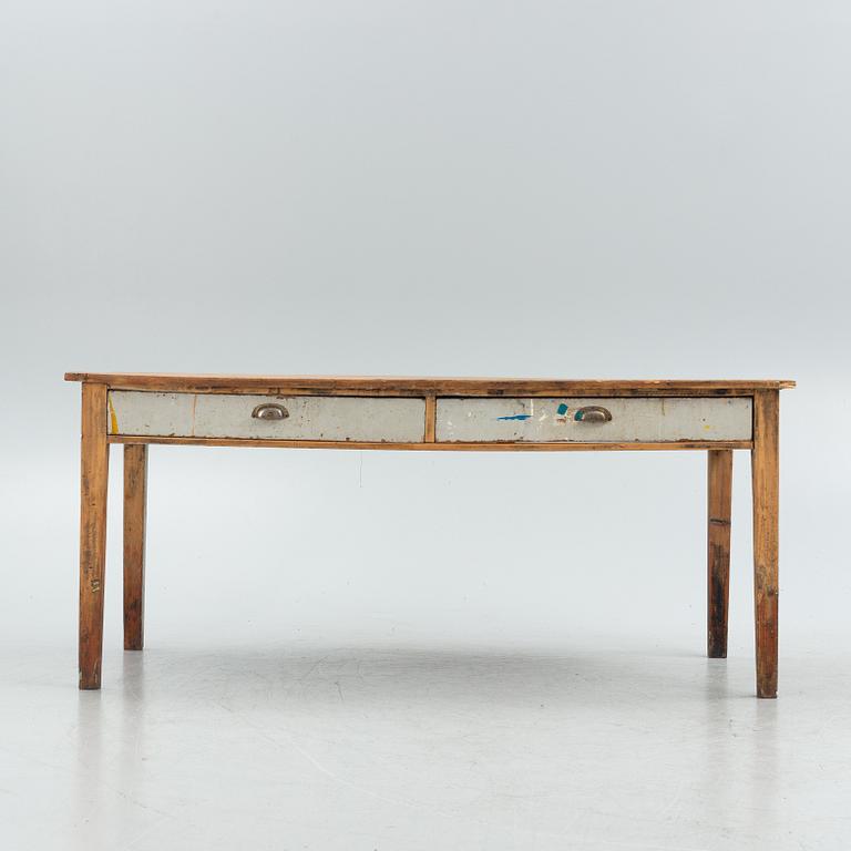 An early 20th century pine table.