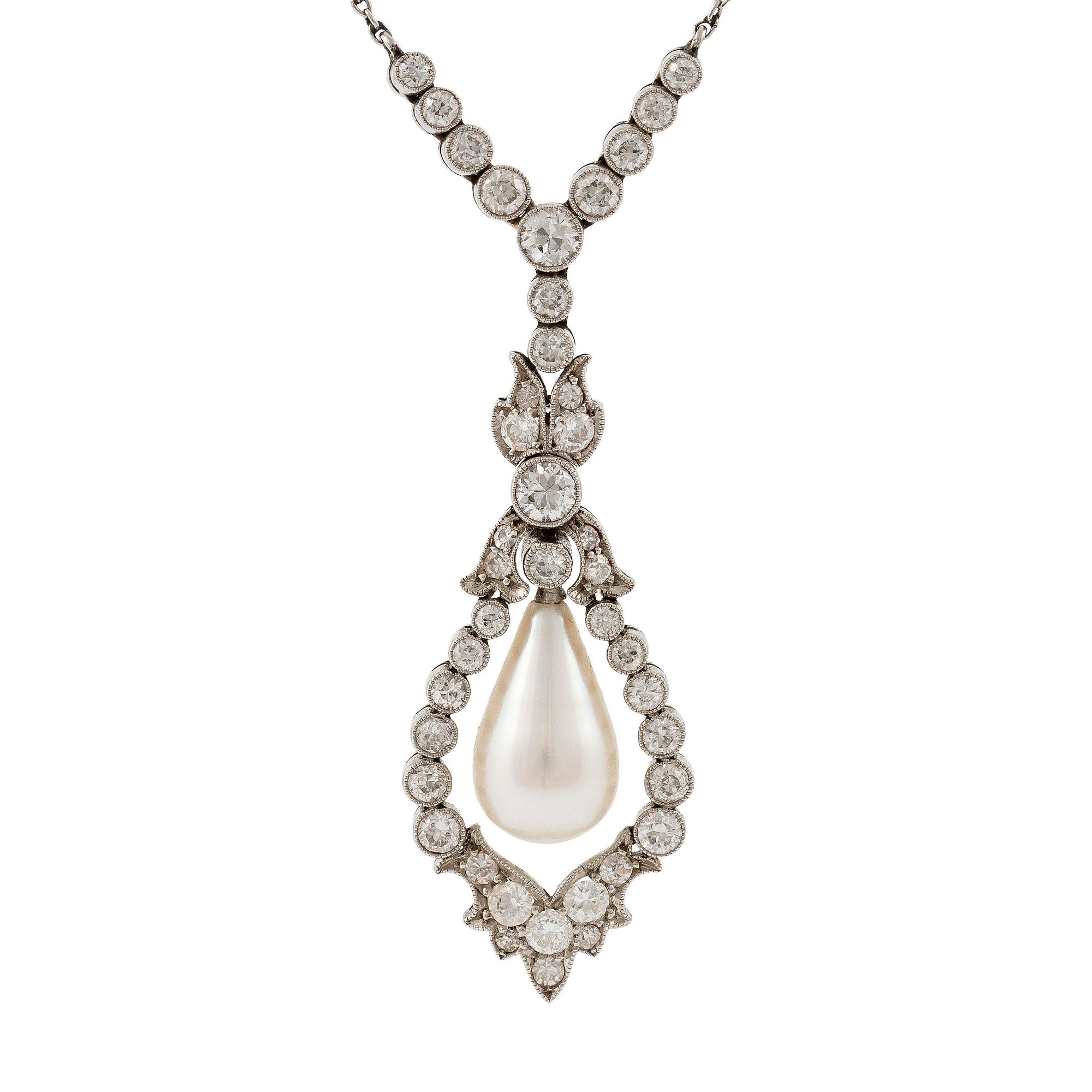A platinum necklace with a drop-shaped pearl.
