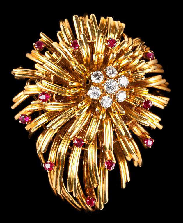 An 'en tremblant' ruby and diamond flower brooch, 1950's.
