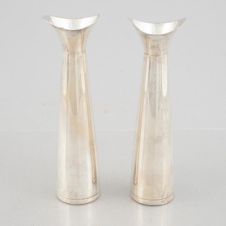 Gustaf Janson and Vera Ferngren, two similar Swedish silver candlesticks, mark of CG Hallberg, Stockholm 1956-59.