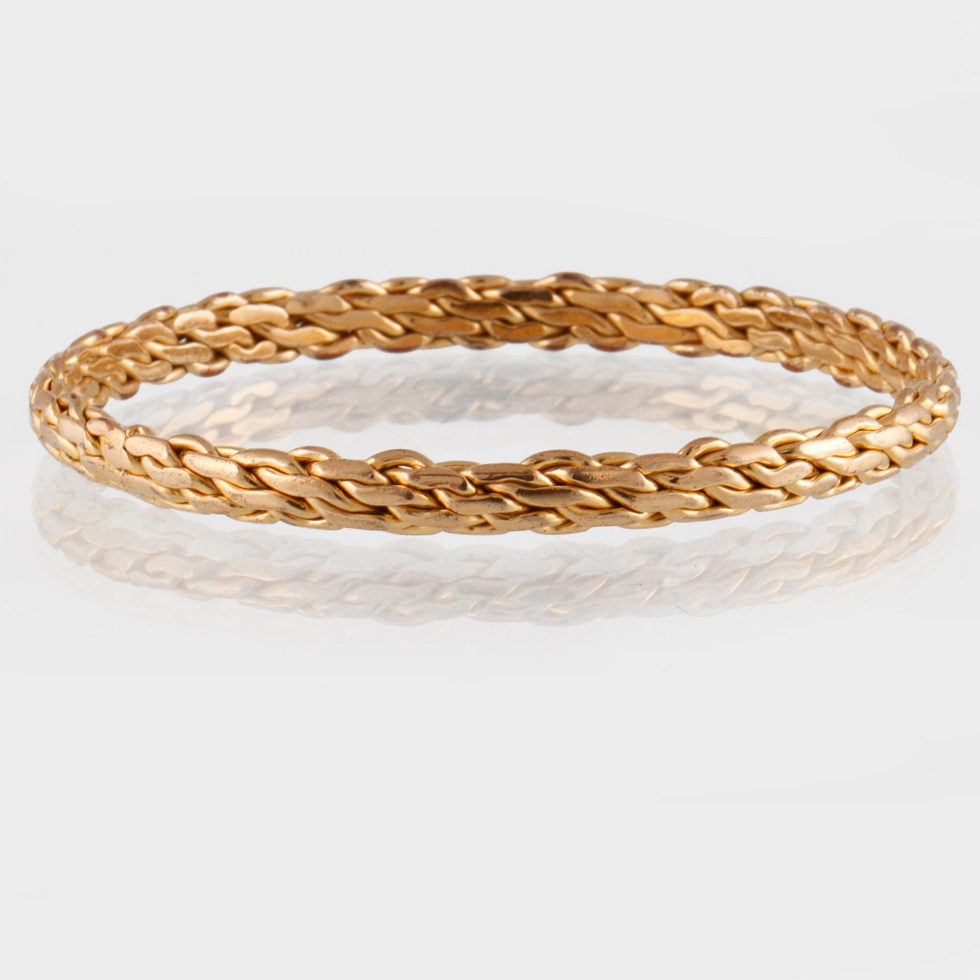 ARMRING, 10K guld, utländsk stämpel. Vikt 24,8 gram.