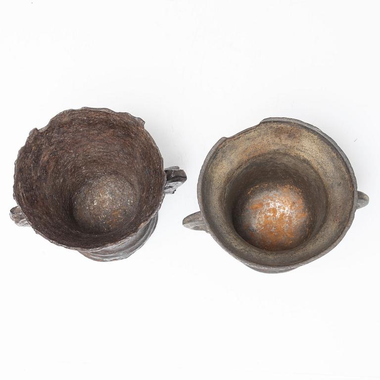 A set of two renaissance-type cast-iron mortars, 17th century.